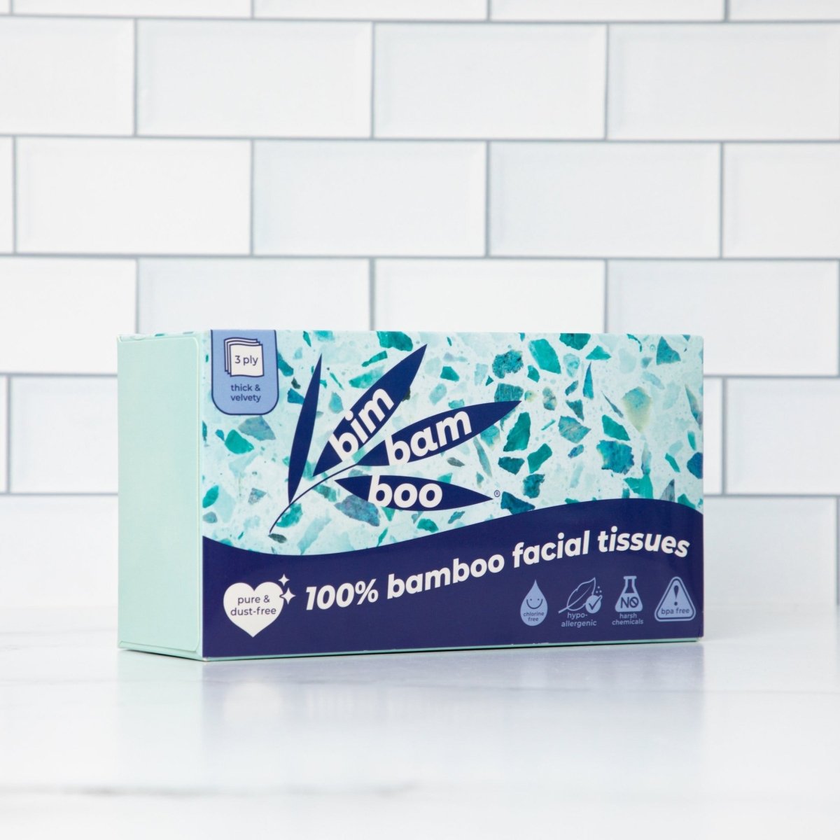 Box of Bim Bam Boo 100% bamboo facial tissues on a tiled background.