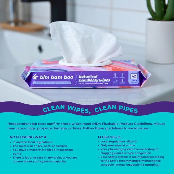 Bim Bam Boo botanical bamboo wipes packaging on a bathroom counter with text about using the wipes.